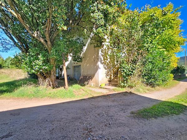 Maison de 127 m² avec jardin, garage et caves – Le Bousquet-d'Orb (34600) 3 chambres | Jardin de 190 m² | Grand garage + caves | Travaux à prévoir