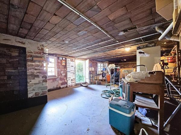 Maison de 127 m² avec jardin, garage et caves – Le Bousquet-d'Orb (34600) 3 chambres | Jardin de 190 m² | Grand garage + caves | Travaux à prévoir