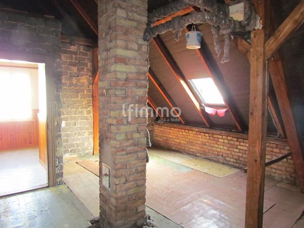 Maison à rénover sur environ 2.2 ares