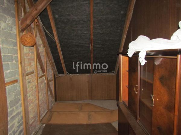 Maison à rénover sur environ 2.2 ares