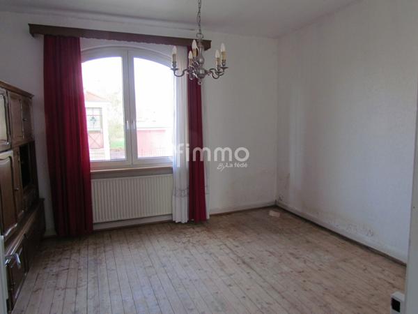 Maison à rénover sur environ 2.2 ares