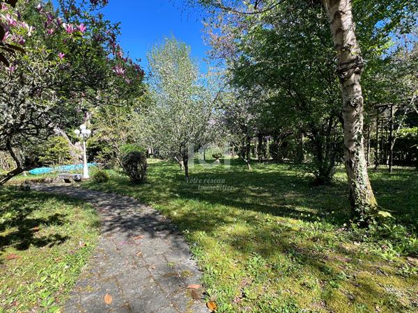Maison d'exception 226 m² centre Sautron sur parc 5 000 m² (Prix marché)