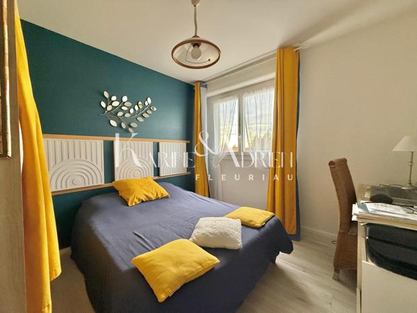 Appartement 2 chambres, balcon, cave privative et garage privatif