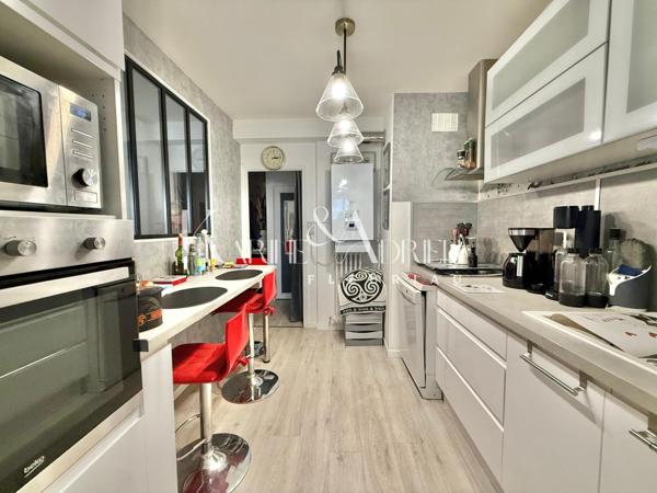 Appartement 2 chambres, balcon, cave privative et garage privatif