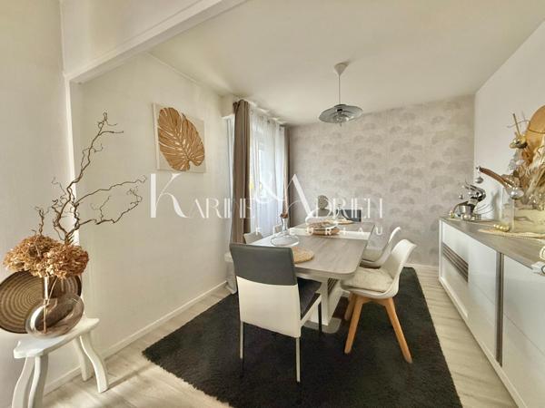 Appartement 2 chambres, balcon, cave privative et garage privatif