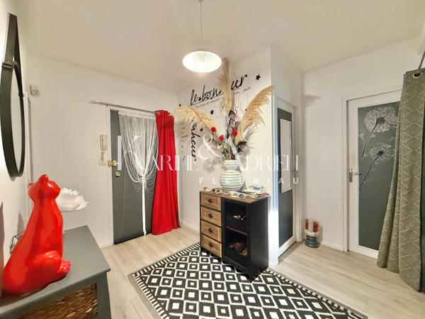 Appartement 2 chambres, balcon, cave privative et garage privatif