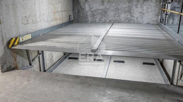 A vendre: Lot de 2 places de parking avec système hydraulique