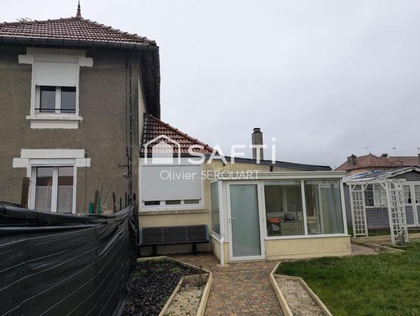 MAISON 2 CHAMBRES AVEC DOUBLE  GARAGE