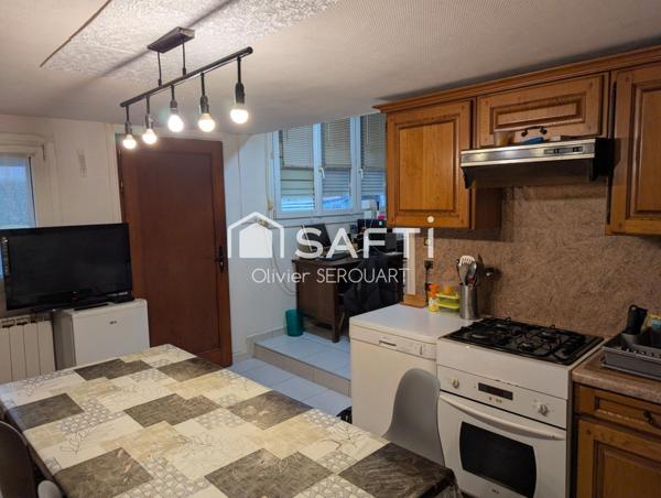 MAISON 2 CHAMBRES AVEC DOUBLE  GARAGE