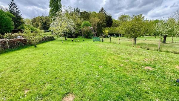 Maison avec confort de plain-pied, sous-sol, sur terrain de 1452 m2