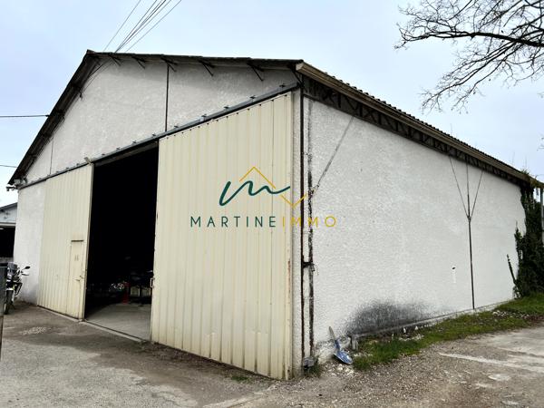A vendre hangar avec terrain à bâtir