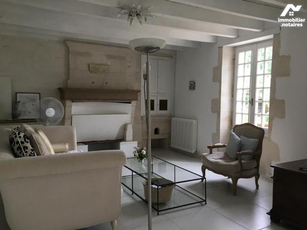 IEDEAL MAISON DE VACANCES OU PREMIER INVESTISSEMENT POUR CETTE AGRÉABLE MAISON EN PIERRE AVEC JARDIN