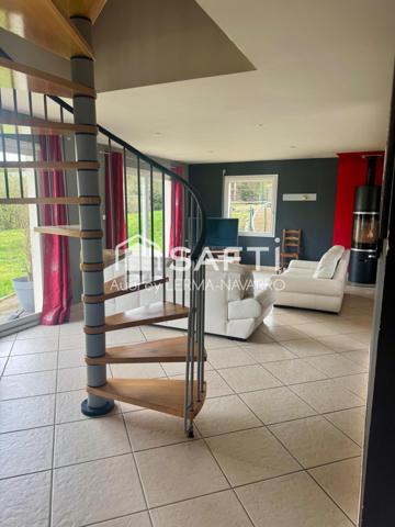 Maison contemporaine 4 chambres avec garage et dépendance avec vue panoramique sur la campagne.