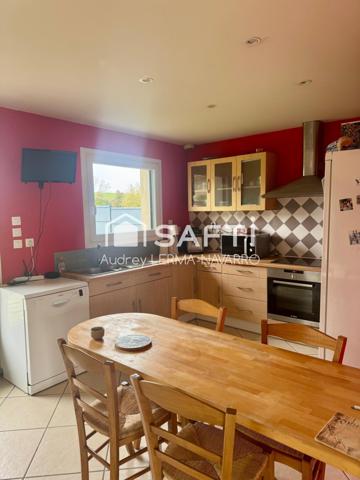 Maison contemporaine 4 chambres avec garage et dépendance avec vue panoramique sur la campagne.