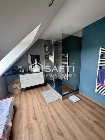 Maison contemporaine 4 chambres avec garage et dépendance avec vue panoramique sur la campagne.