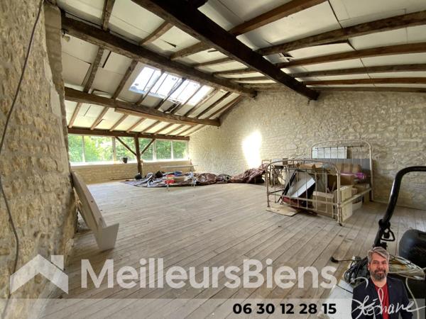 Immeuble habitation et commerce avec jardin rue piétonne Jonzac