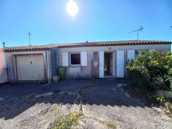 Maison de plain-pied à rafraîchir - Proche centre-ville