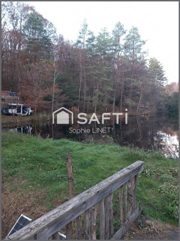 Etang avec maisonnette 19 m2 sur parcelle de 2 Hectares