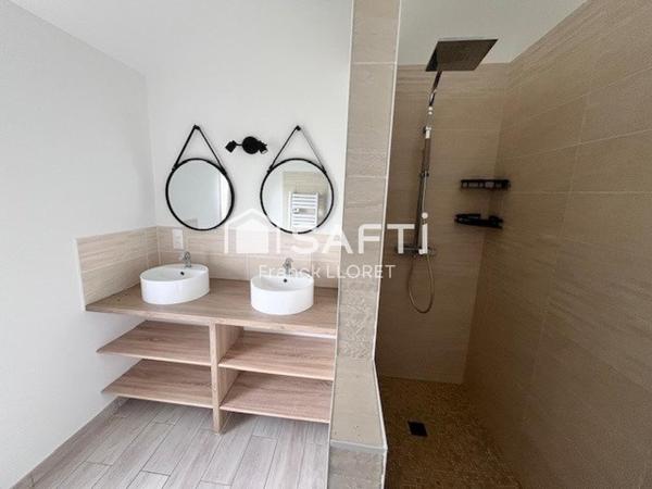 Maison recente 100m², 4 chambres, petit jardin.