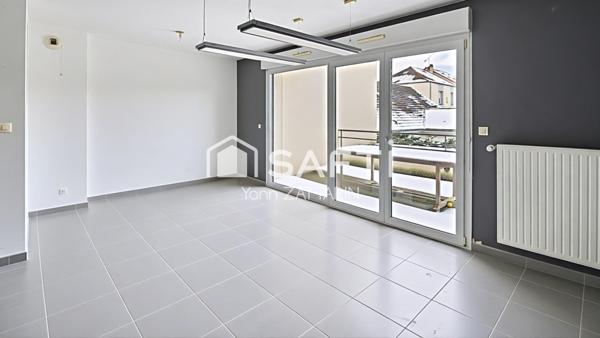 Appartement F3 avec terrasse, garage et parking
