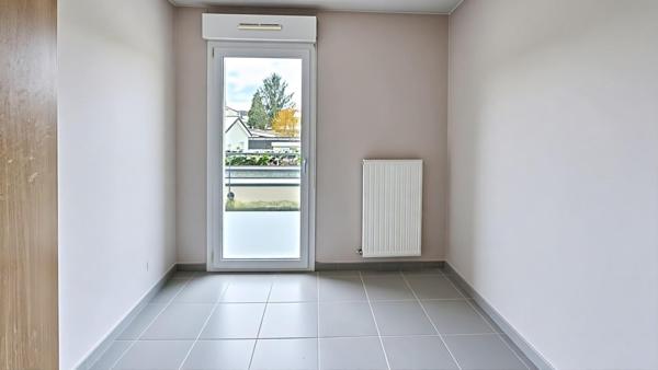 Appartement F3 avec terrasse, garage et parking