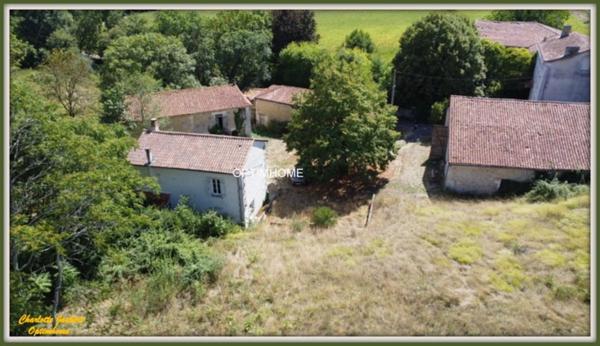 moulin à rénover avec dépendances et plus de 1,5 ha de terrain