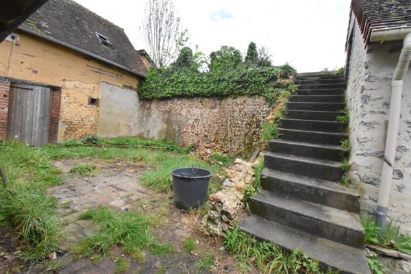 Luigny (28480) Maison de village