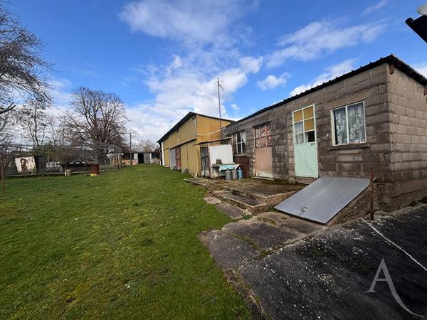 Ensemble de deux maisons à Bourges avec terrain et dépendances !