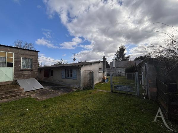 Ensemble de deux maisons à Bourges avec terrain et dépendances !