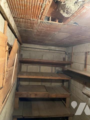 CENTRE-VILLE UN APPARTEMENT 4 PP AVEC CAVES - GRENIER ET GARAGE