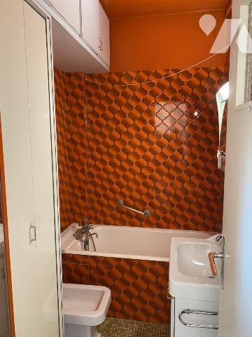 CENTRE-VILLE UN APPARTEMENT 4 PP AVEC CAVES - GRENIER ET GARAGE