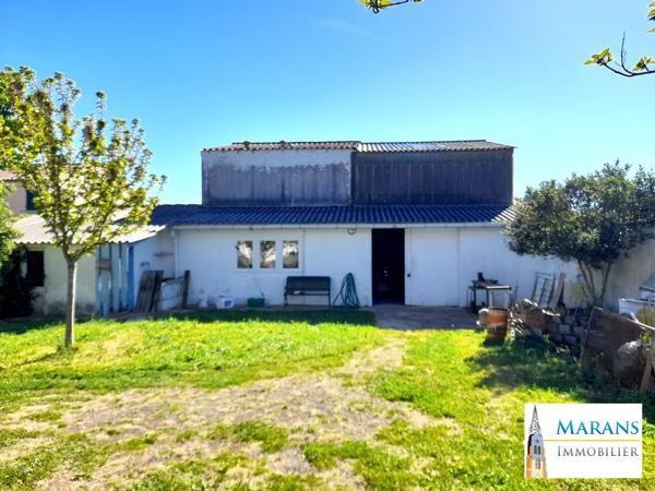 batiment sur terrain à lotir
