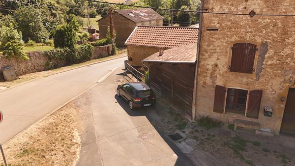 VILLECLOYE Charmante maison de village avec jardin, garage et terrasse couverte