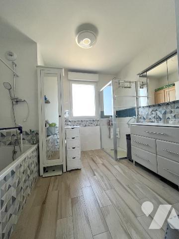 Exclusivité - A Cormontreuil, au sein d'une résidence de 2019 avec ascenseur, découvrez cet app...