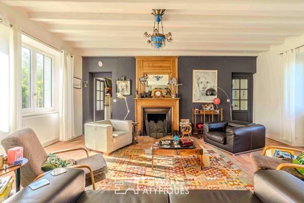 Propriété d’exception offrant une vue unique au coeur d’un cadre verdoyant