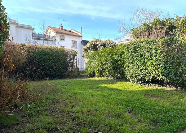 Appartement T3 de 89m² en rez de jardin privatif de 55m² et terrasse de 13m²