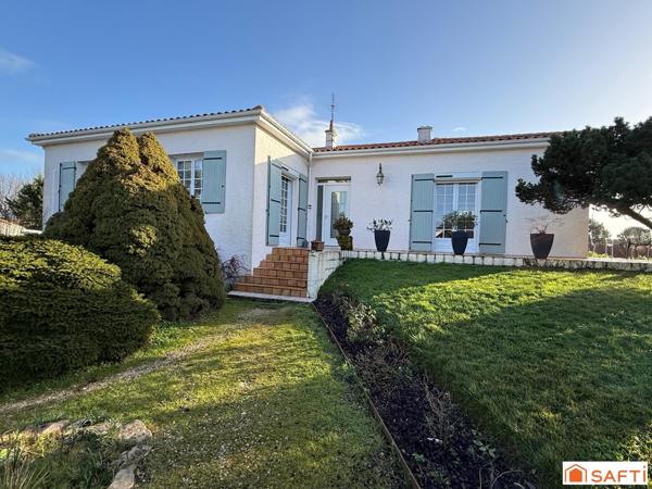 Maison 7 pièces d'environ 159 m2 avec garage proche de tous commerces