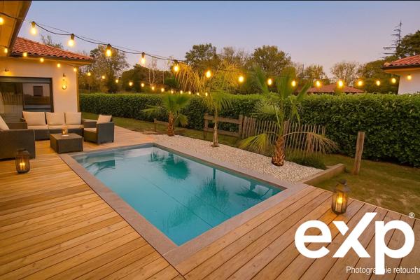 Maison contemporaine de plain-pied - piscine à 2 tours de roues de l'océan