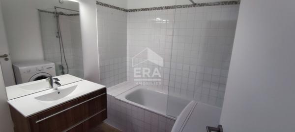 Appartement T1 40 m2 avec balcon, cave et parking couvert.