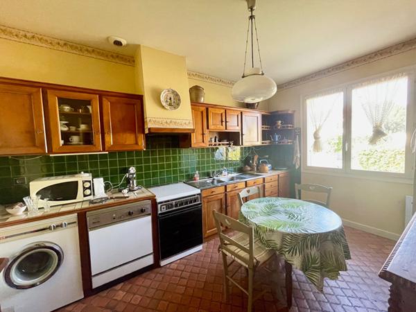 Maison L'Isle Jourdain 6 pièce(s) 143 m² avec garage et terrain de 1320 m²