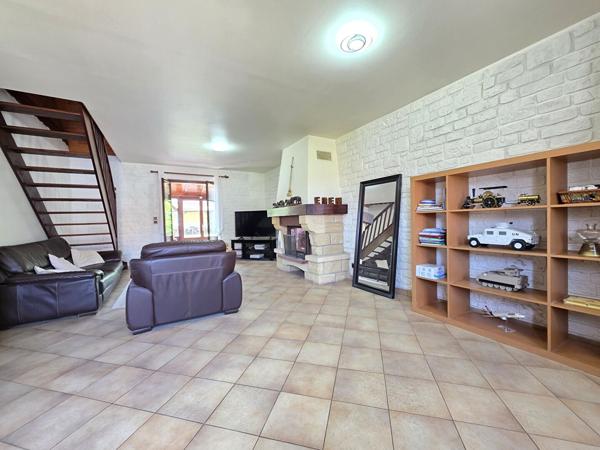 Maison 3 chambres avec véranda, insert et garage - Secteur calme proche toutes commodités
