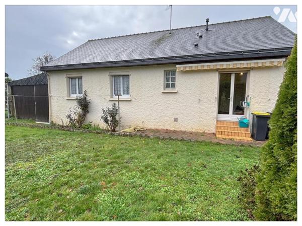 Maison de plain pied, avec appentis pour  Camping car