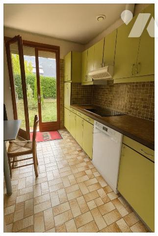 Maison de plain pied, avec appentis pour  Camping car