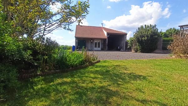 Sur 1874 m² de terrain , 4 Chambres, dépendances