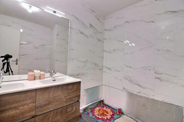 Appartement Lyon 4 pièces dans un immeuble de 2024 avec jardin terrasse et garage