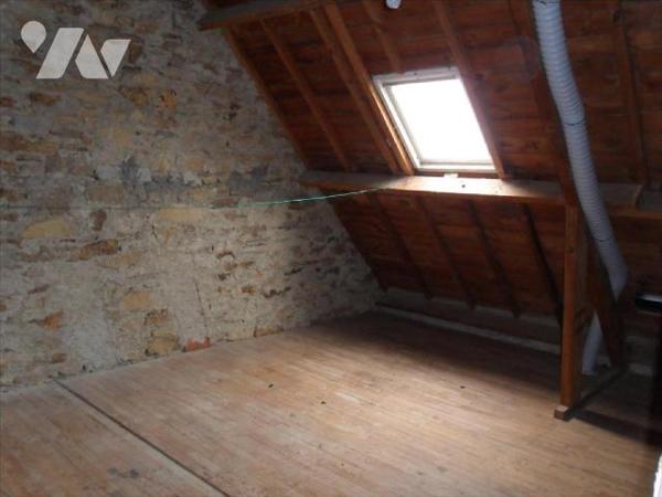 Maison d'habitation des années 1970's , sur les hauteurs de Port Launay comprenant au rez-de-ch...