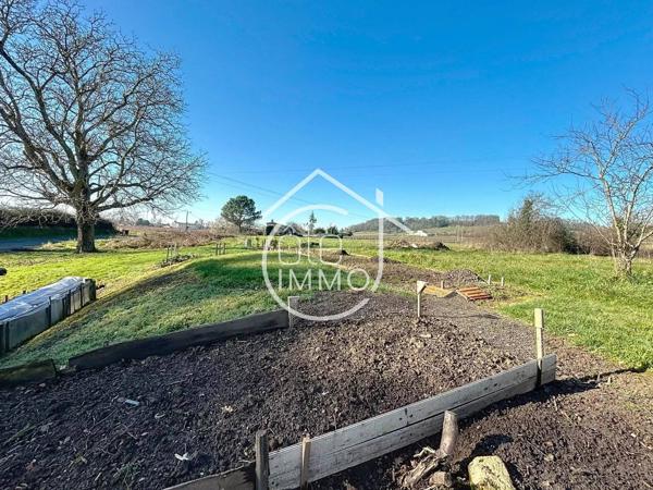 Castillon-la-Bataille : Maison à rénover avec jardin et garage