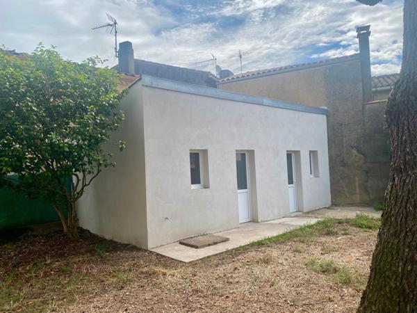 maison d'habitation rénovée avec garage, jardin et dépendance