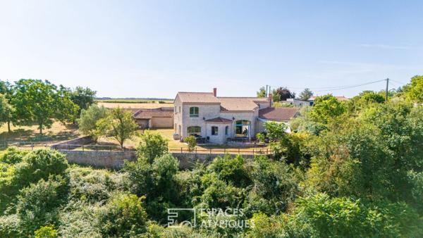 Maison de charme ouverte sur l’horizon