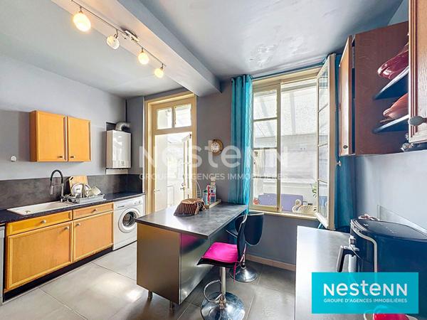 APPARTEMENT 98M2  DEUX CHAMBRES UN BUREAU BALCON JARDIN D HIVER CAVE ET GARAGE PARC DES PROMENADES